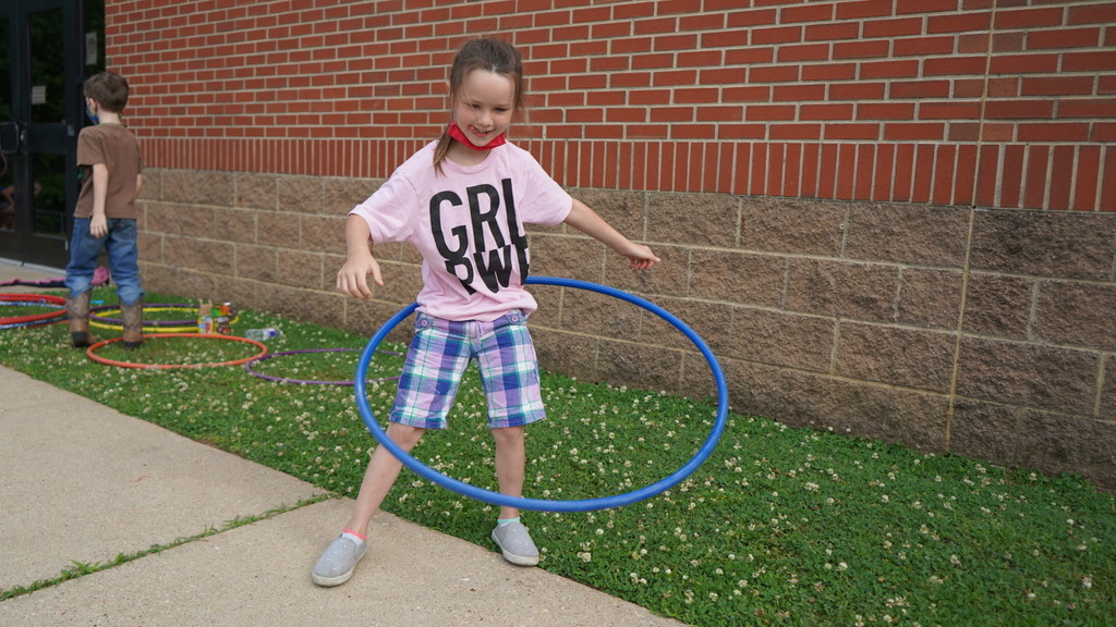 Image of Sheridan Elementary School student hula-hooping