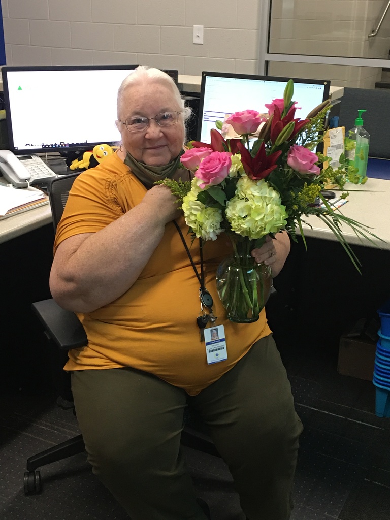 Image that shows Mrs. Deuerling with her birthday flowers.