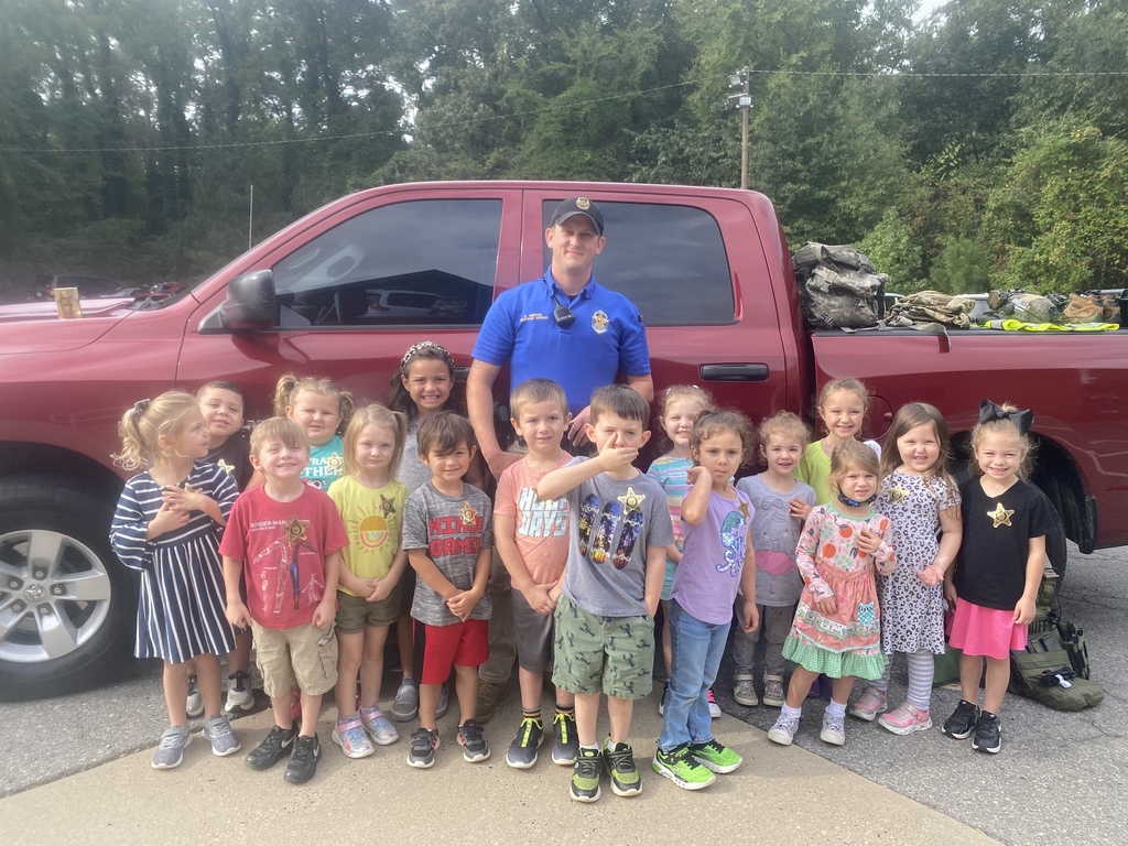 Mrs. Clay's class with Officer Chris.