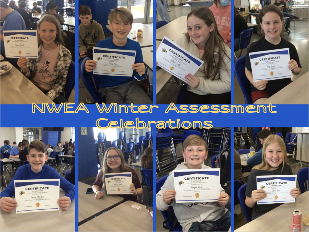 7th-grade students with their achievement awards.